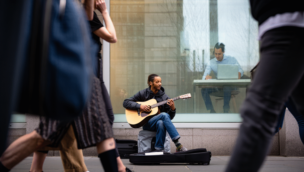 Musicista di strada ignorato dai passanti vs businessman di successo in ufficio - il mercato premia le soluzioni, non le passioni