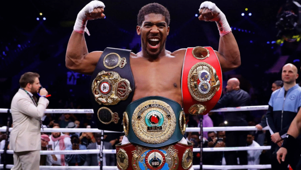 Anthony Joshua campione del mondo con cinture da pugile, mentalità vincente e disciplina da campione